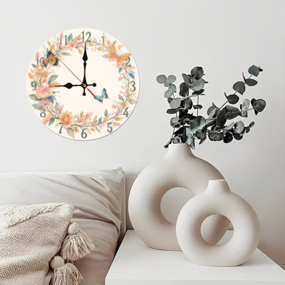 Horloge florale avec papillons