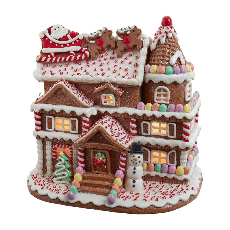 Maison de pain d'épices pré-éclairée avec père Noël Kurt Adler
