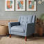 Fauteuil capitonné avec pieds en bois-1054946826