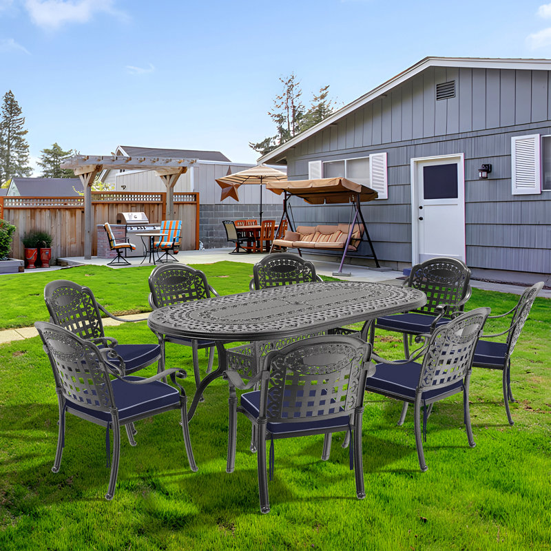 9-Piece Set Of Cast Aluminum Patio Furniture, 9 Pieces: Table, 8 Chairs, Blue