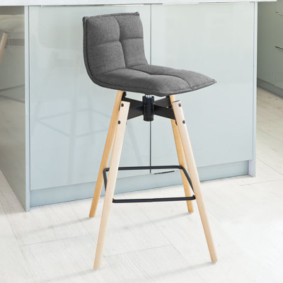 Carwile Swivel Upholstered Bar Stool with Solid Wood Frame