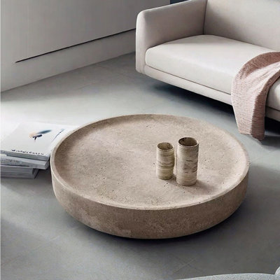 Table basse ronde en fibre de verre avec surface lisse