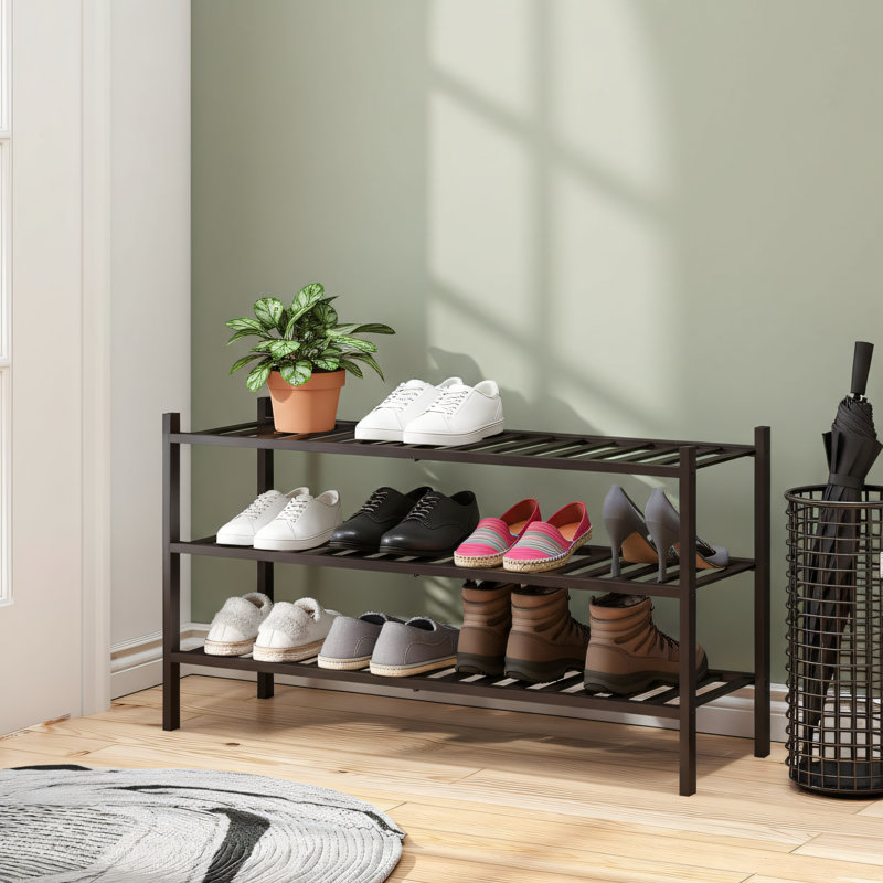 Four-Tier Bamboo Shoe Rack, Freestanding And Stackable, Suitable For Wardrobes, Entryways, And Small Spaces., Brown