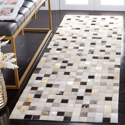 Tapis en cuir feutré à la main Herren ivoire / noir