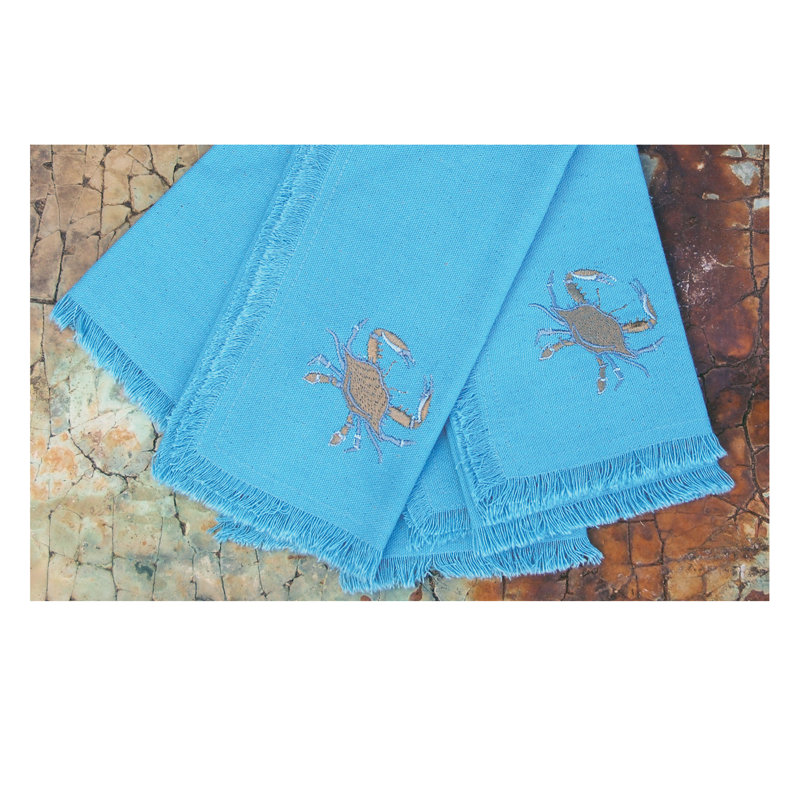 Ensemble de quatre serviettes en crabe bleu brodées