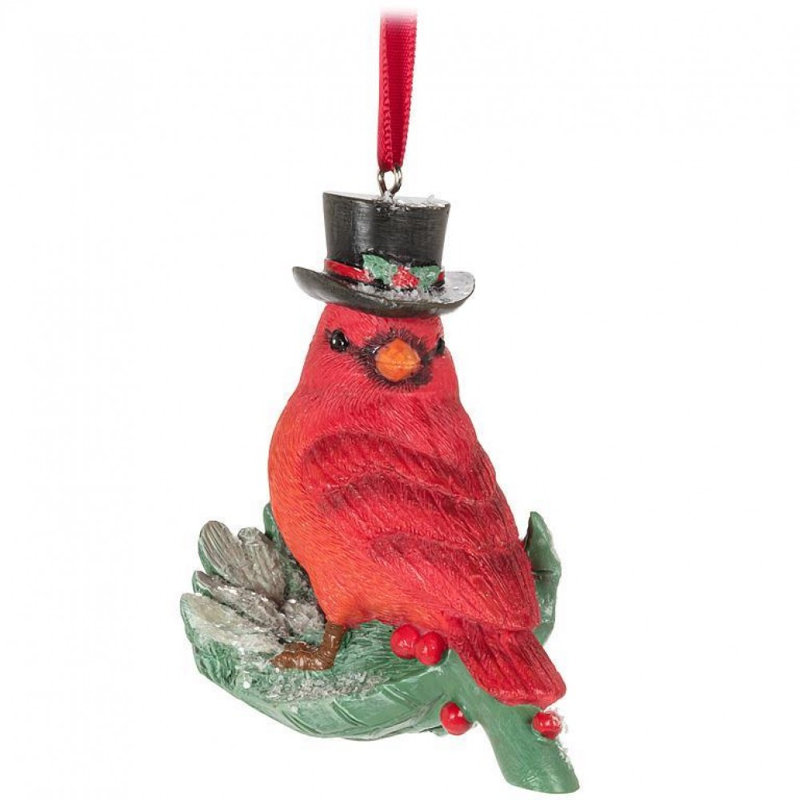 Ornement cardinal sur feuille de houx