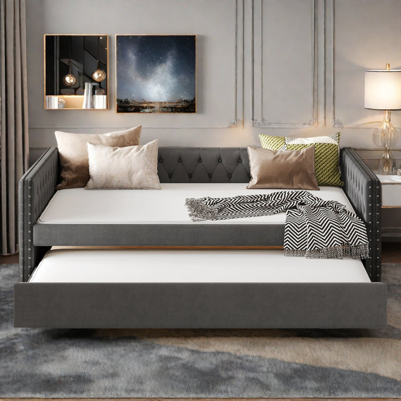 Lit de jour rembourré avec un bouton, un lit gigogne, une conception capitonnée et une décoration cloutée en cuivre , Gris