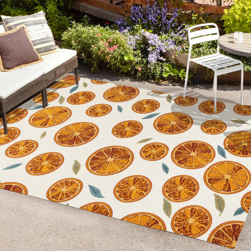Kaue Citrus Slice High-Low Orange/Cream Indoor/Outdoor Rug, Rectangle 7'9" x 10'