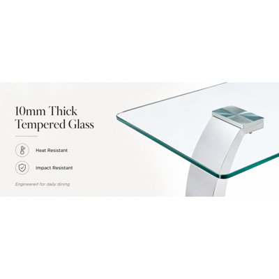 Table de salle à manger 63 x 35,4 x 30 pouces en verre transparent - un mélange parfait de durabilité et d'élégance. Plateau de table en verre trempé transparent, pieds de table en acier inoxydable argentés.