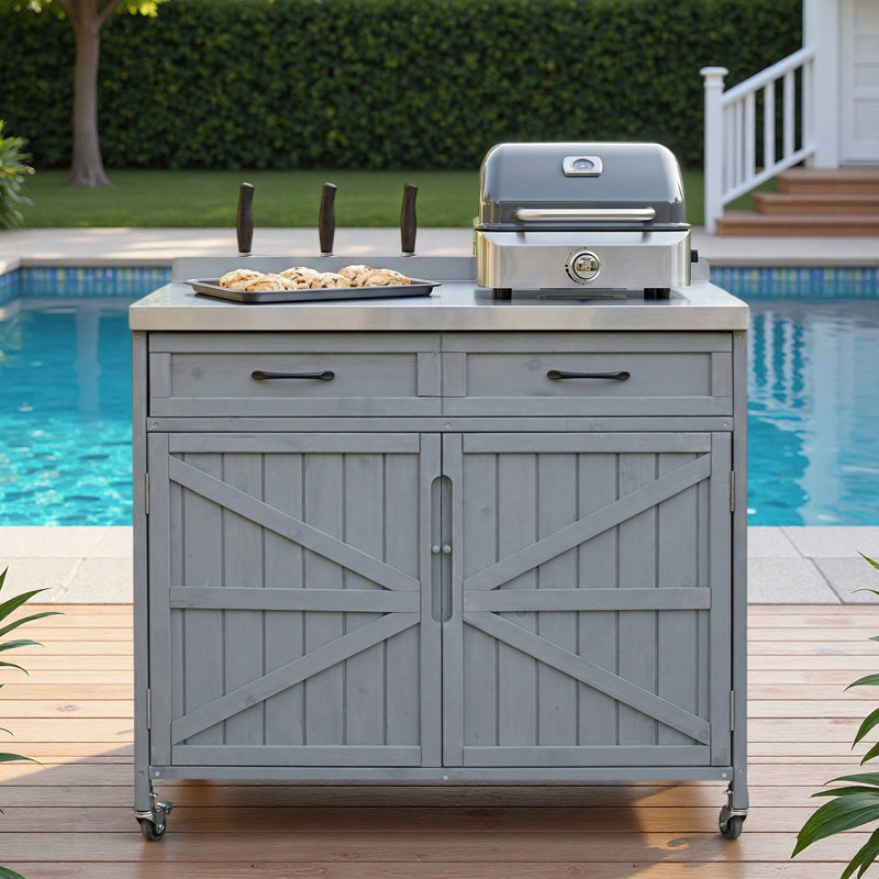 Îlot de cuisine extérieur avec plateau en acier inoxydable, grand tiroir, tablettes réglables, supports de rangement internes et 4 roulettes