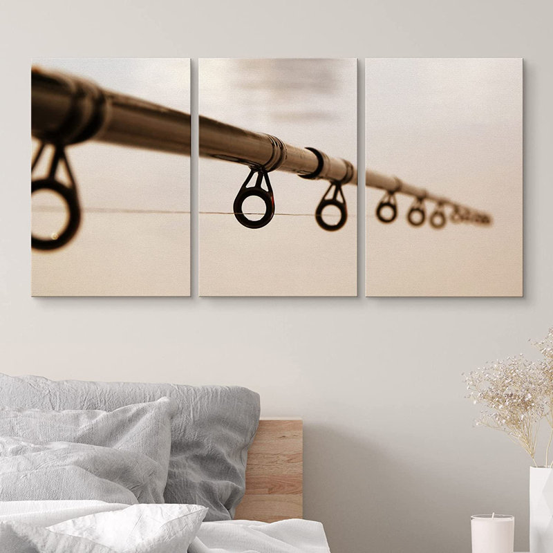 " Close Up View Of Brown Fishing Rod Against The Water Surface " 3 - Pieces, 36" H x 72" W, Wrapped Canvas