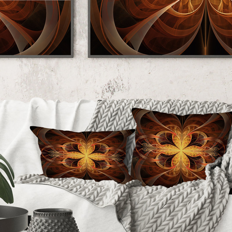 Coussin décoratif orange à motif floral orange
