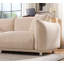 Canapé à trois places avec coussins moelleux à haute résilience, dossier ergonomique, revêtement beige neutre et design moderne peu encombrant pour un confort de tous les jours.