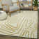 Tapis crème / doré à motif abstrait Arlington