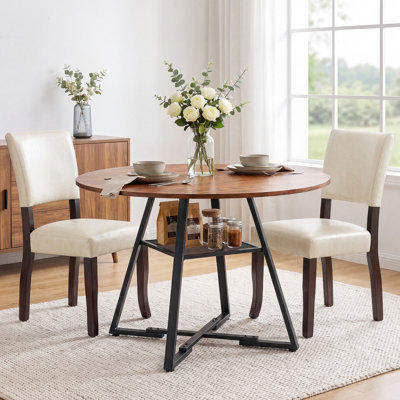 Ensemble de table de salle à manger: table de salle à manger ronde industrielle de 47 po avec pieds en croix et tablette de rangement en filet et chaises de salle à manger rembourrées en bois de style Mid-Century