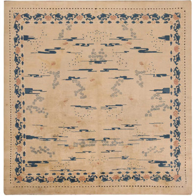 Tapis carré ivoire et bleu