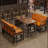 Noorah 4 - Person Solid Wood Top Trestle Base Dining Set