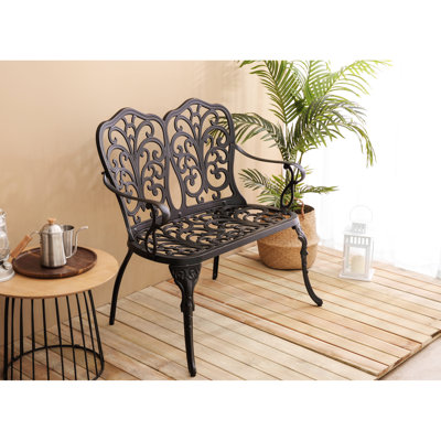 Siège en fonte d'aluminium avec détails floraux pour un look extérieur élégant - Motif de chaise de patio en métal noir