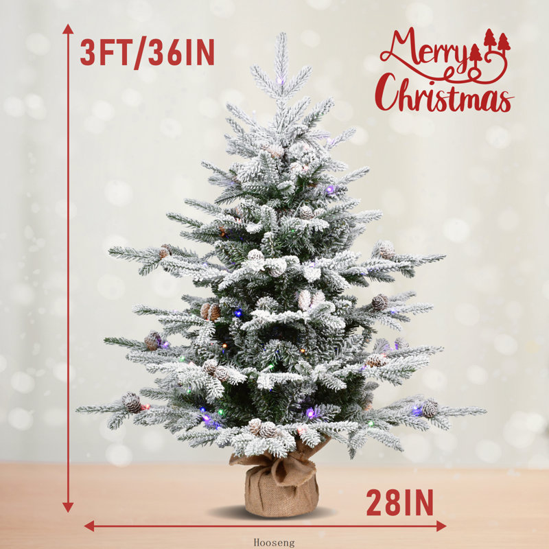 Sapin de Noël floqué préilluminé de 90 cm avec 100 lumières DEL bicolores et 528 branches, base en toile de jute et ciment