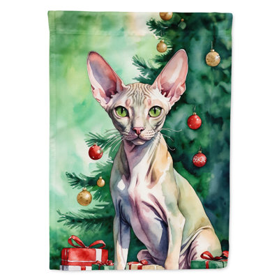 Chat avec le drapeau de la cabane dans l'arbre de Noël