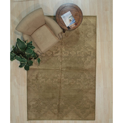 Tapis transitionnel en laine noué à la main beige Bradley