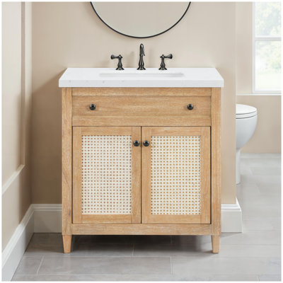 Meuble-lavabo de salle de bain de 31 pouces en chêne clair avec panneaux en rotin, comptoir en pierre reconstituée et portes à fermeture amortie
