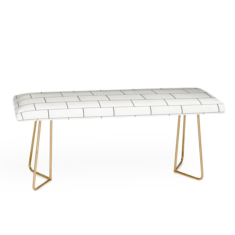 Banc rembourré en brique imparfaite