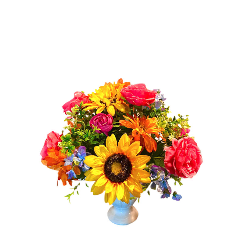 Arrangement floral mélangé dans un vase