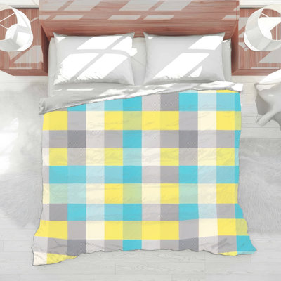 Couette à motif à carreaux pastel