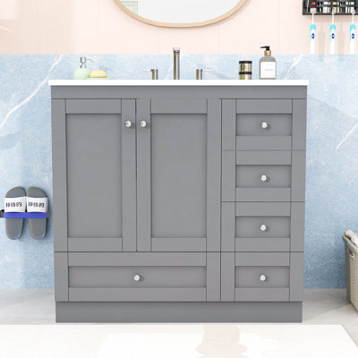 Meuble-lavabo autoportant avec lavabo intégré, tiroirs et portes à fermeture en douceur pour salle de bain
