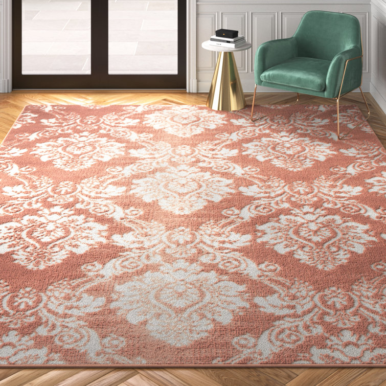 Coyst Damask Orange/White Area Rug