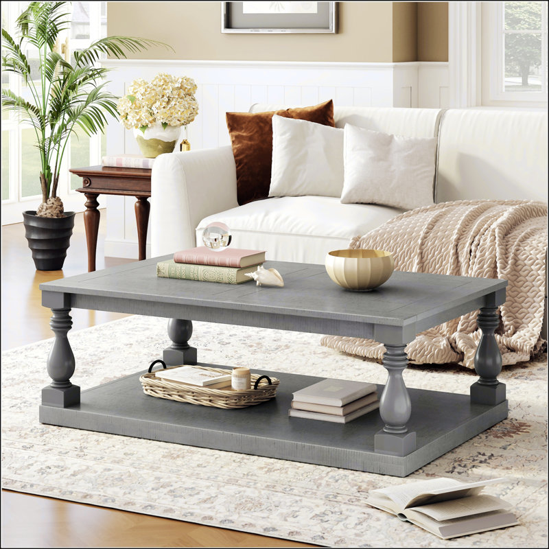 Table basse rétro avec pieds de colonne en vase artistique et placage de pin luxueux, parfaite pour le salon et le bureau