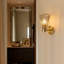 Applique murale simple en métal doré, abat-jour filaire, éclairage moderne et luxueux polyvalent