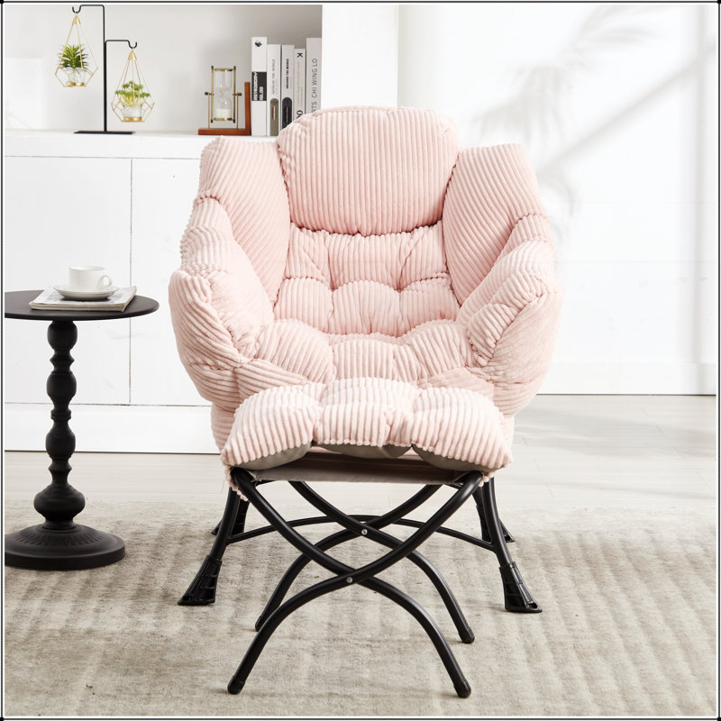 Fauteuil lounge moderne avec repose-pieds, accoudoirs et poche latérale, idéal pour les petits espaces, lecture et détente confortables.