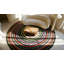 Tapis rond tressé antique à motif circulaire