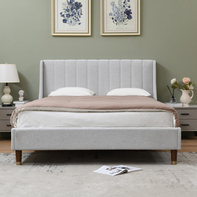 Linvel Upholstered Wingback Platform Bed
