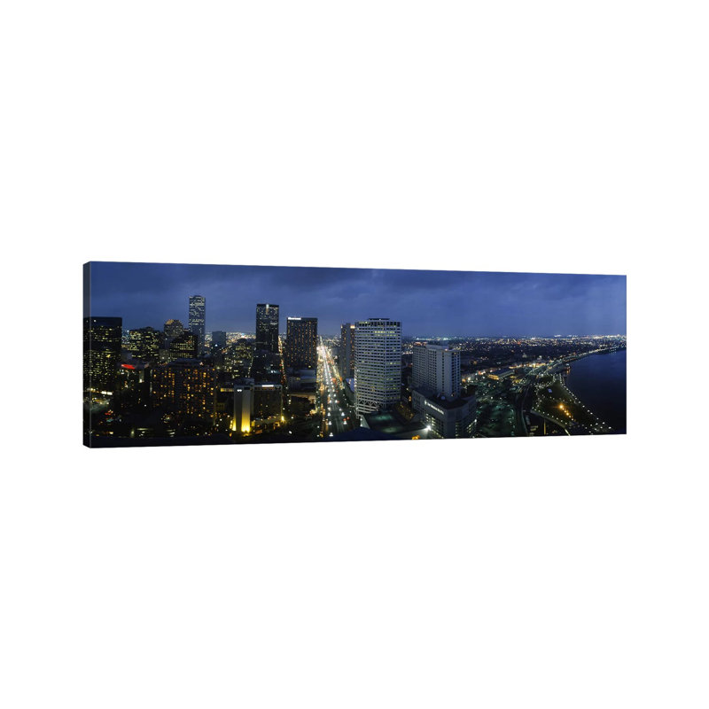 High Angle View of Buildings in a City Lit up at Night 1 Piece Wrapped Canvas Panoramic Wall Art