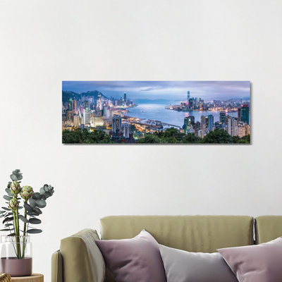 Hong Kong Skyline Panorama At Night by Jan Becke - Wrapped Canvas Panoramic Print