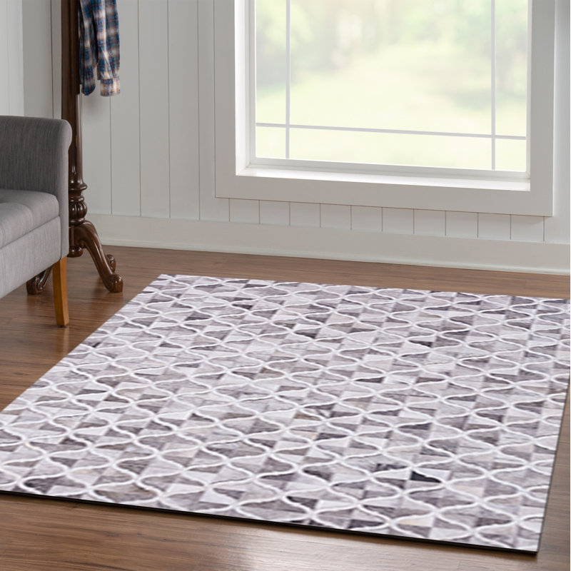 Jameown Patchwork Faux Cowhide Gray/Black Printed Area Rug, Rectangle 6'7" x 9'7"
