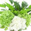 Centre de table d'hortensias dans un vase en verre