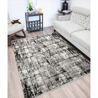 Tapis rectangulaire noir / gris en polypropylène tissé à la machine 3 pi 3 po x 6 pi 7 po