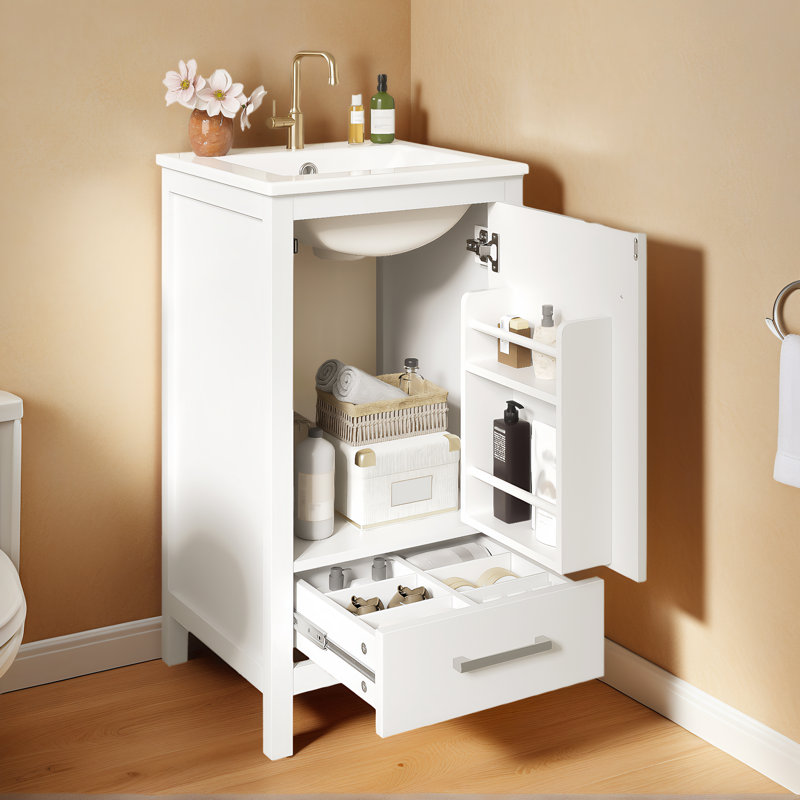 Meuble-lavabo moderne de 18 pouces avec lavabo en céramique, tiroirs à fermeture en douceur et organisateur de porte, tiroir de séparation et patins réglables en plastique - solution de rangement compacte pour les espaces étroits