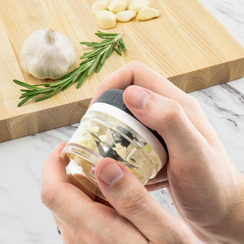 Tovolo Chop N’ Spin Mini Chopper, Spinning Mini Garlic Mincer, Stainless Steel Rolling Garlic Chopper With Nylon Blade Guard, Press & Chop Garlic Press, BPA-Free & Dishwasher-Safe Kitchen Gadget