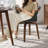 Wathen Faux Leather Upholstered Swivel Dining Arm Chair-1723066011