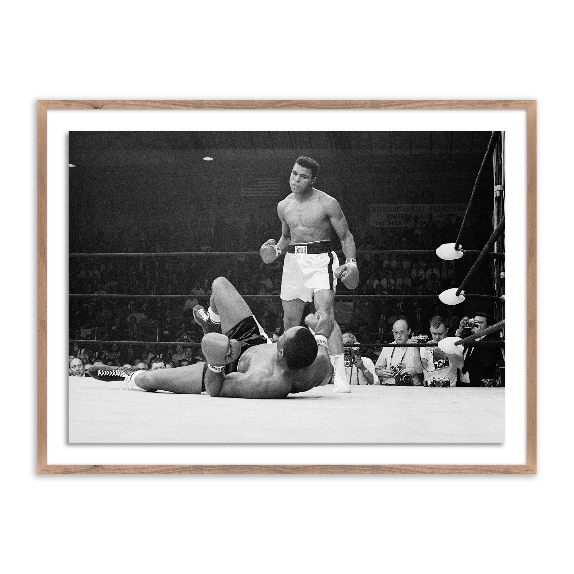 Boxers Muhammad Ali And Sonny Liston Fighting by Getty Images, 36" H x 48" W, Rustic Walnut Framed