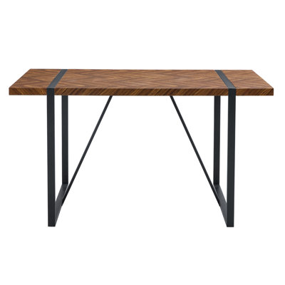A minimalist retro rectangular dining table with a specially textured top and black metal legs