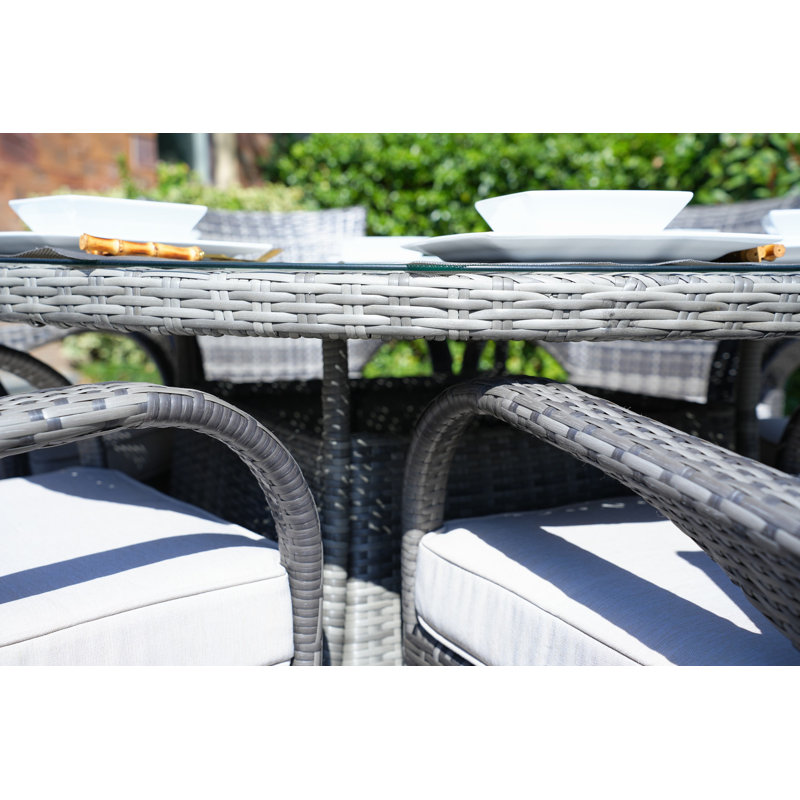 Therasa 6 - Person Patio Dining Set with Round Table , Cushions Included, Gray