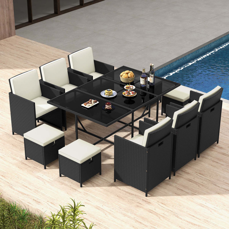 Elpida 8 - Person Patio Dining Set with Rectangular Table , Cushions Included