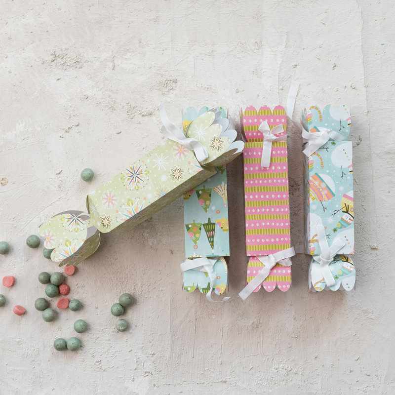 Boîte-cadeau en forme de bonbon avec motif de Noël et attaches à ruban