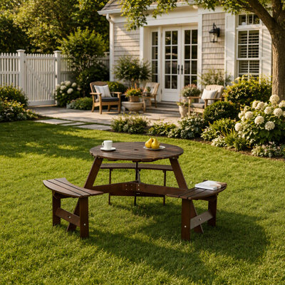 Table de pique-nique d'extérieur ronde avec bancs intégrés et trou pour parasol, idéale pour les repas en plein air sur la terrasse ou dans le jardin.